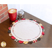 An image of a Scalloped Table Topper in Coffee Always styled on a brown table.