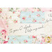 close up of rectangular blocks in pink, blue and cream cream floral fabrics with a small panel with the words 