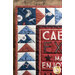 A close-up of the border of an On Lake Time Cabin Rules Wall Hanging.