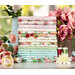 Pink, cream, green and blue floral fabrics on a wood table surrounded by flowers