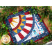 Photo of finished patriotic quilt square laying flat with greenery around the edges.