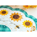 Close up photo of a white scalloped table topper with aqua plaid edges and center with simple applique sunflowers in a ring, accented by hand embroidered bee details