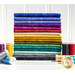 A collection of neatly stacked fabrics in various colors, including shades of blue, purple, yellow, green, and black, is displayed alongside spools of thread in coordinating colors.