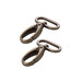 2 antique brass finished metal swivel hooks on rings on a white background