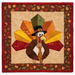 Photo of the finished foundation paper piecing block for November featuring a turkey dressed in a tie and capotain, isolated on a white background