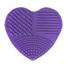 purple silicone heart cutting mat scrubber on a white background