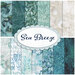 Collage image of sea inspired fabrics in the Sea Breeze collection, in shades of blue, white, teal, and aqua