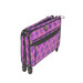 A collapsed purple suitcase with a geometric pattern and black accents, featuring wheels and a front pocket.