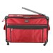 Red rolling luggage with black accents, featuring a front pocket and extendable handle.