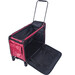 A red suitcase with wheels with an open black interior and foldable lid, designed for easy transport.