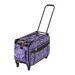 A patterned rolling suitcase in purple with diamond designs and a retractable handle.