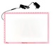 A pink light tracing pad with a ruler along the edge, accompanied by a power adapter.