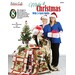 Front of Make It Christmas 3-Yard Quilts pattern book with two smiling people standing beside quilts