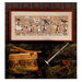 Framed “Twelve Days of Christmas” artwork above a drum, nutcracker, and evergreen branches.