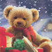 Close up swatch of Letters to Santa panel showing detail and scale of the teddy bear behind Santa.