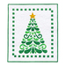 A quilted wall hanging featuring a green Christmas tree design with swirls and a yellow star on top, surrounded by a decorative border of green squares on a white background.