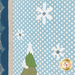 A close up on the white applique snowflakes embellished with coordinating fabric buttons on the blue and white polka dot background.