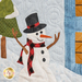 A friendly snowman with a black hat, red and black checkered scarf, and carrot nose stands in a snowy scene. In the background, there are trees and a blue building with windows.