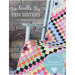 Front of the pattern book, showing a multicolor quilt staged on a blue rocking chair outdoors