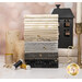 white, ecru, gray, and black fabric with gold metallic accents on a white table surrounded by gold ribbon, candles, and neutral threads