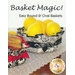 Image of a book cover titled Basket Magic! Easy Round & Oval Baskets. The cover features two fabric baskets, one filled with yellow lemons and the other with baked goods, against a textured background. The branding logo of Shabby Fabrics appears at the bottom.