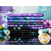 A stack of fabrics in the Luminous FQ set with colored jars, thread, and flowers.