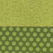 Split fabric: left features large green polka dots on a dark green background; right has a light green leafy pattern.