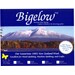 Product packaging for Bigelow premium wool batting, featuring snowy mountains and details about its use in quilting.