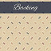 A swatch of cream fabric with tossed red, navy blue, earth green, and golden yellow floral emblems and circle dots. A navy blue banner at the top reads 