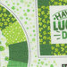 A green fabric with clovers, circles, and a Have a Lucky Day message.