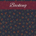 A swatch of navy blue fabric with a pattern of ditsy flowers and dot circles. A red banner at the top reads 