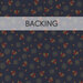 A swatch of navy blue fabric with a pattern of ditsy flowers and dot circles. A red banner at the top reads 