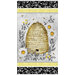 Panel fabric with a bee skep, flowers, and stripe design on a honeycomb background.