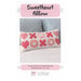 Front cover of the Sweetheart Pillow pattern showing the finished pillow on a quilted background.