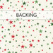 A swatch of cream fabric packed with red and green stars of varying shades and sizes. A muted green banner at the top reads 