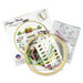 The packaging, contents of the cross stitch kit, and pattern displayed on a white background. 