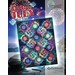 Pattern front cove with a colorful quilt design featuring a star pattern, with a firework motif with a dark background fabric