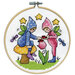 A closeup of the finished Fairies cross stitch inside a wooden hoop isolated on a white background.