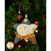 A close up on the ornament featuring a baby in a manger, showing detail on the star button and hay made of chunky thread.