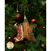 A close up on the ornament featuring the camel, showing detail on the blanket and button embellishments.