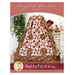 Front cover of the pattern featuring the completed quilt, artfully draped on a quilt ladder and staged with coordinating décor.
