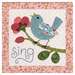 The completed Blossom Trail - Sing Mini Quilt, isolated on a white background.