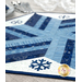 A super close up on a dark blue applique snowflake, demonstrating fabric, binding, and stitching details.