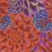 Colorful fabric with packed purple, red, blue, and burnt orange flowers