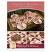 The front cover of an English Garden Table Runner Pattern that showcases a floral table runner on a rich brown table.