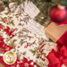 A close up on the tree skirt, demonstrating fabric details; coordinating decor peeks into frame from the top and right sides.