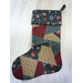 Another version of the quilted stocking, colored in muted floral fabrics and creatively stitched.