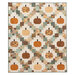 The completed Pumpkin Patches Quilt, colored in elegant and muted colors like cream, burnt orange, and eucalyptus, isolated on a white background.