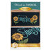 The front of a Shabby Fabrics pattern showing a black wool mat with the words 