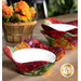 A stylized shot of the completed bowl cozies, colored in richly colored fabrics from the Wine Country - Artisan Batiks collection, staged with coordinating flowers and holding white bowls..